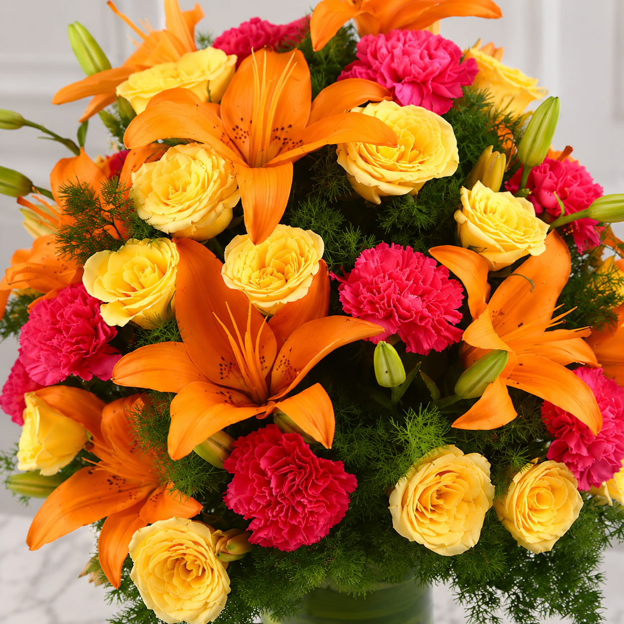 Orange Lilies, Yellow Roses & Pink Carnations Bouquet