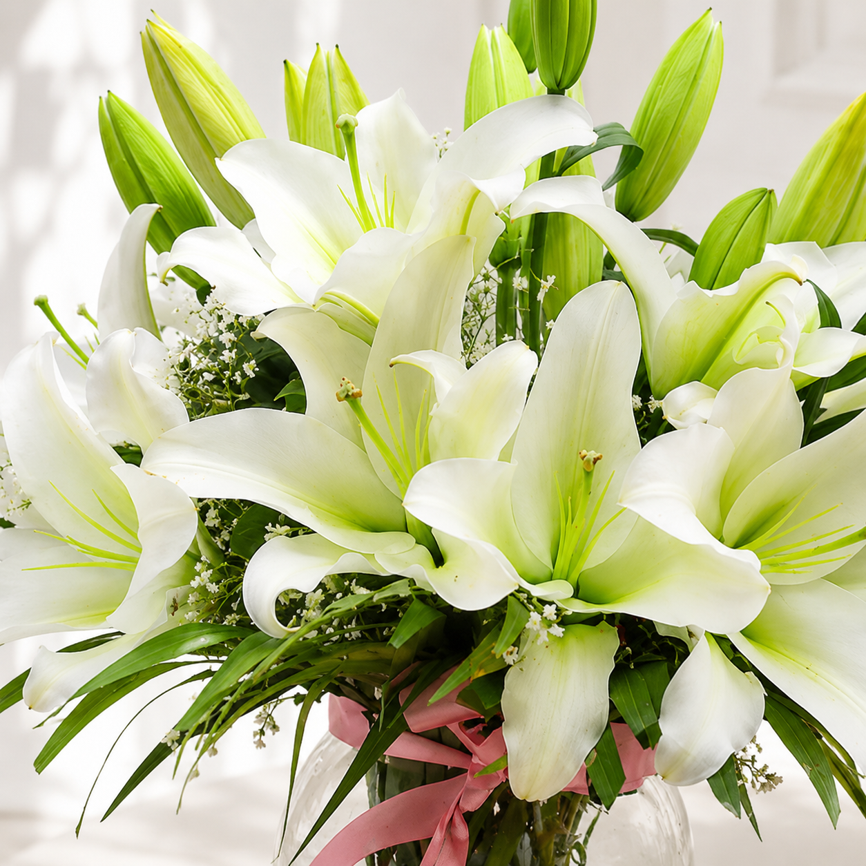 Elegant White Lily Bouquet  in Glass Vase