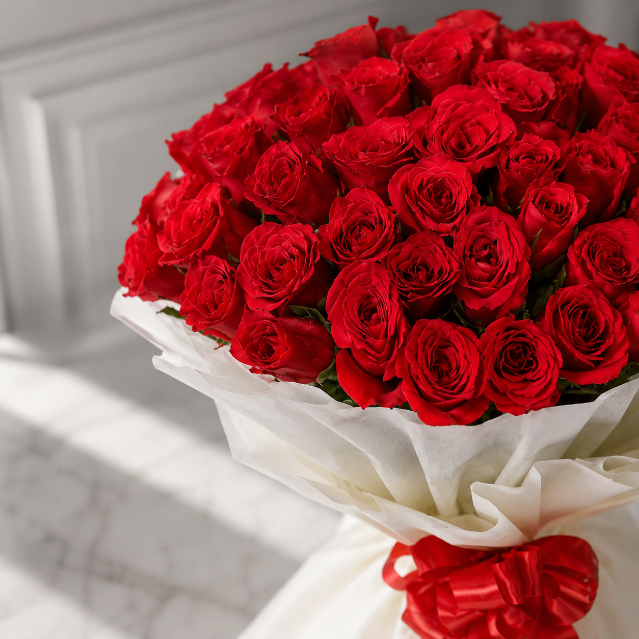 100 Blooming Red Roses Wrapped in White