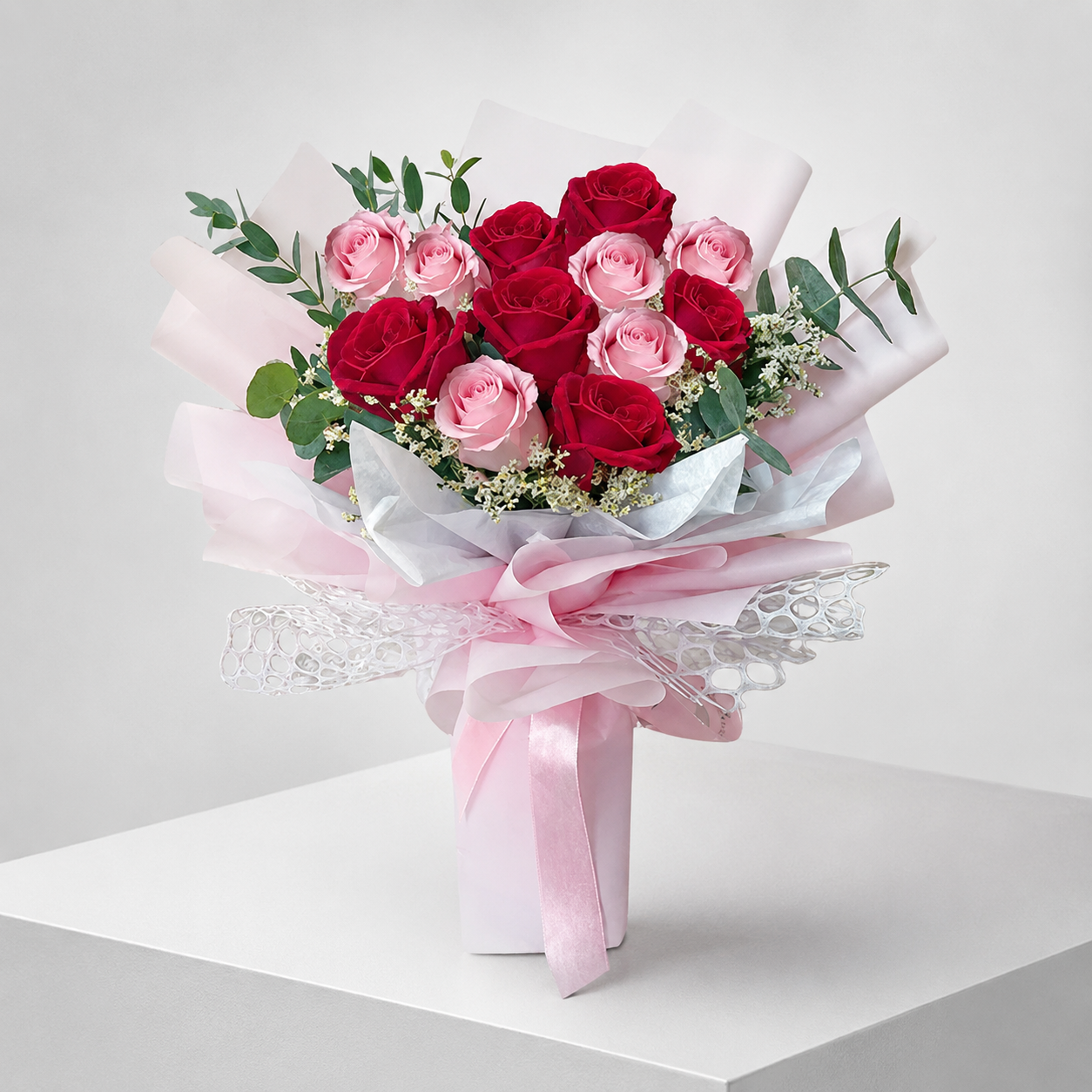 12 Dark Pink & Baby Pink Roses in Elegant Packaging