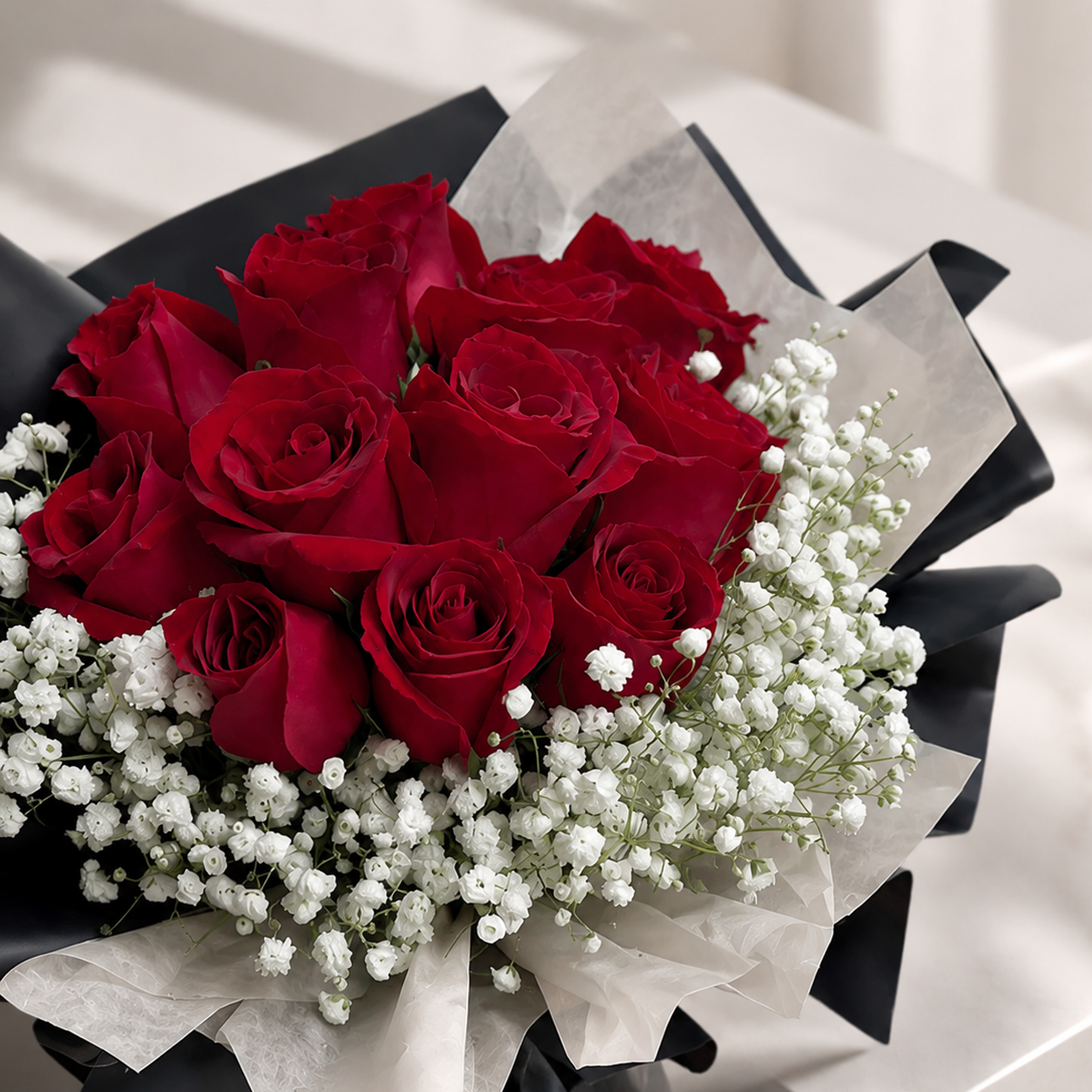 Love Special: 12 Red Roses with Black & White Wrapping