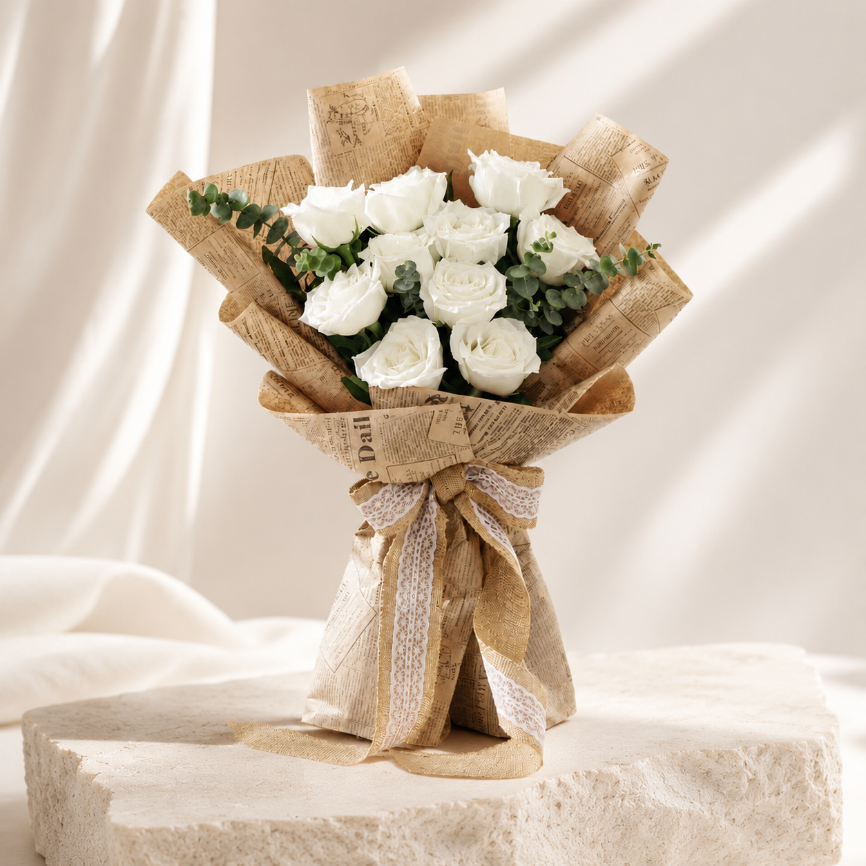 Elegant White Rose Bouquet Wrapped in Vintage Newspaper