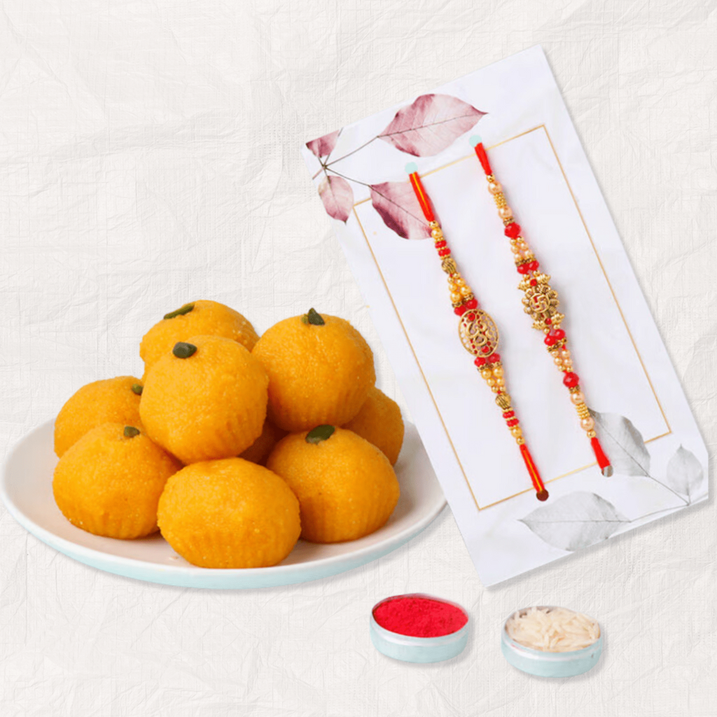 Om & Swastik Rakhi Set of 2 with Scrumptious Laddoo