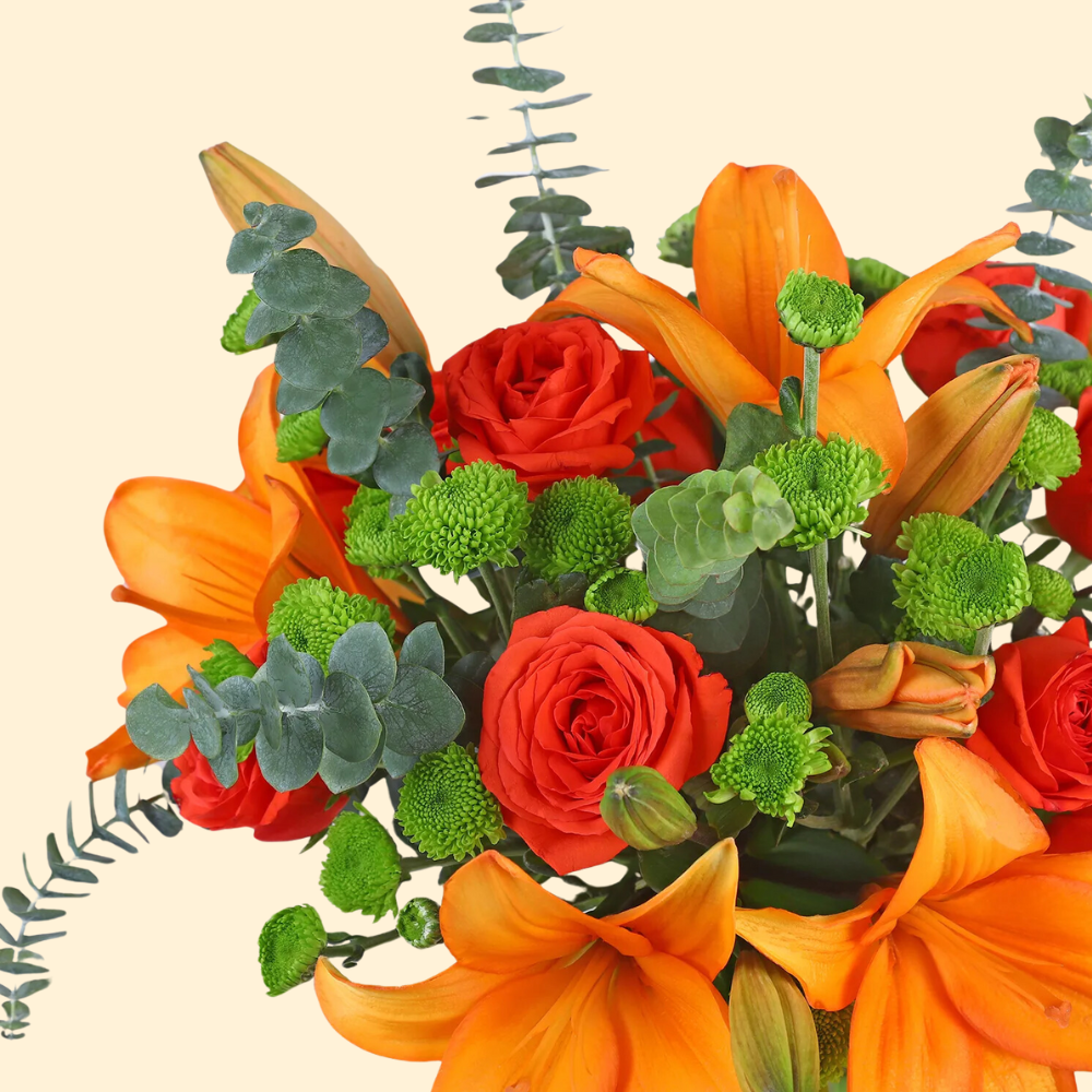 Orange Lilies and Roses Bouquet in Glass Vase